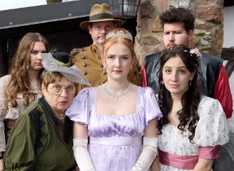 Sechs kostümierte SchauspielerInnen des TKV